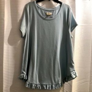 Light blue ruffled bottom top